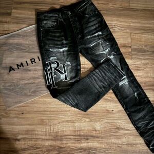 AMIRI Black and White Skinny Jeans